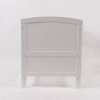 Convertible Wooden Baby Crib Front View Front view of white wooden convertible baby crib with slatted side