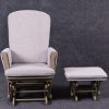 Front view of padded wooden nursery glider chair with high back and matching footrest