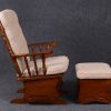 Classic Nursery Glider and Ottoman Side View Side view of classic wooden nursery glider chair and ottoman