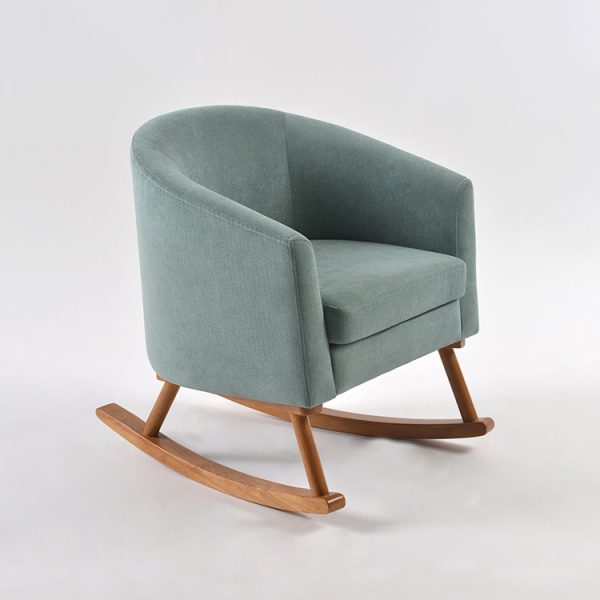 Upholstered Kids Rocking Chair – Angled View Upholstered kids rocking chair in green fabric with curved wooden rocking base