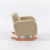Side view of upholstered convertible kids rocking chair showing corduroy fabric and curved wooden rocker rails