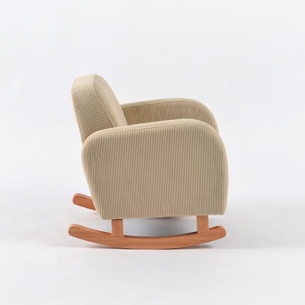 Side view of upholstered convertible kids rocking chair showing corduroy fabric and curved wooden rocker rails