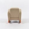 Rear view of convertible baby rocking chair showing padded backrest, corduroy upholstery and wooden rocker base
