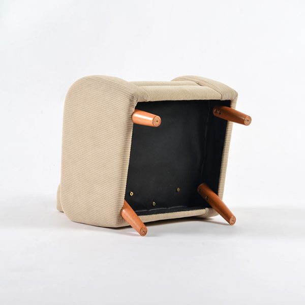Underside view of convertible kids chair showing wooden leg attachment points for interchangeable base configuration
