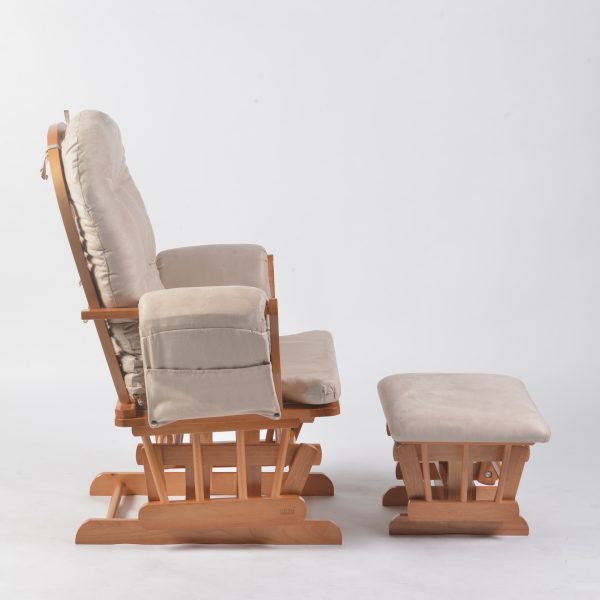 Nursery Glider Chair Side View Side view of wooden nursery glider chair with padded armrests and ottoman