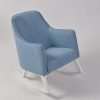 Modern Blue Nursery Rocker Modern blue nursery rocking chair with padded arms and curved wooden base