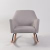 Modern Nursery Rocking Chair Front View Modern nursery rocking chair with light gray upholstery and wood rocker base