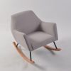 Upholstered Modern Nursery Rocking Chair Light gray modern nursery rocking chair with curved armrests