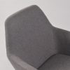 Gray fabric nursery rocker with black metal frame and wooden rails Side view of upholstered nursery rocking chair with curved wooden rails