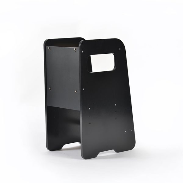 Adjustable kids learning tower with black side panels and natural wood details