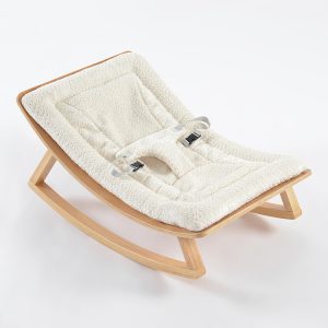Wooden Baby Rocker with Padded Seat Wooden baby rocker with soft cream padded seat and curved rocking base