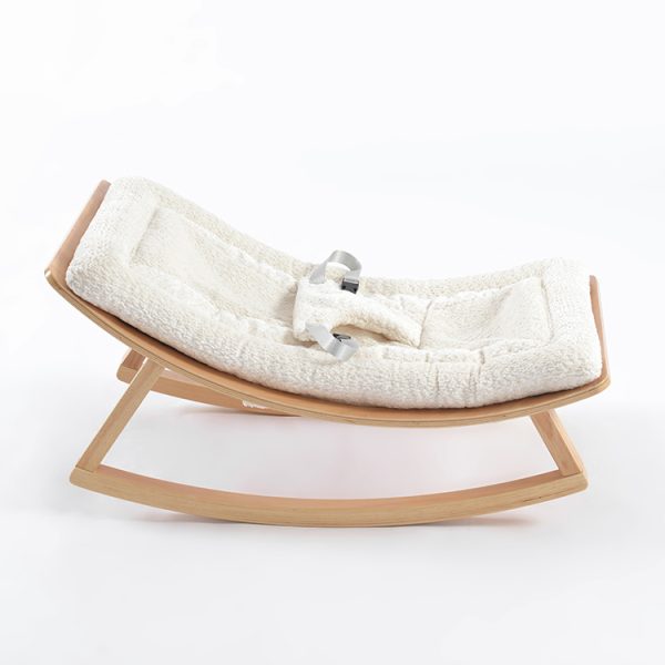Baby Rocker Chair – Side View Side view of wooden baby rocker chair with reclining padded seat