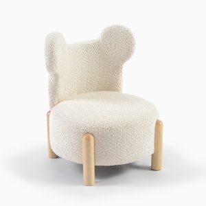 Mouse Ear Bouclé Kids Chair – Side View Cream bouclé kids chair with mouse-ear backrest and natural wooden legs