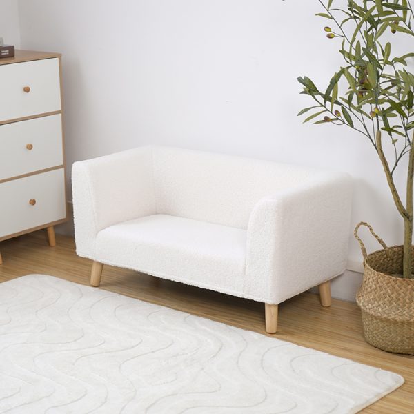 Cream 2-seater bouclé kids sofa with rounded arms and natural wooden legs
