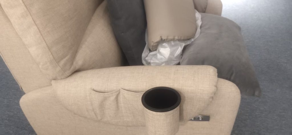 Custom power nursing recliner sample with an armrest cup holder and relocated control buttons.